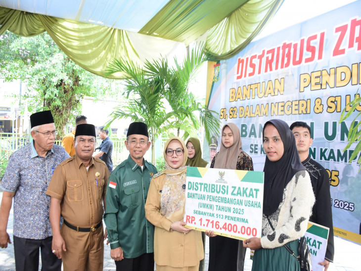 Wakil Bupati Kampar Distribusikan Zakat Bantuan Pendidikan Kepada 1.153 Orang Mahasiswa dari Baznas Kampar